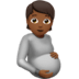 🫄🏾 pregnant person: medium-dark skin tone display on Apple